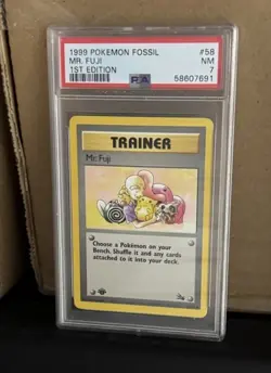 1999 Fossil Set 1st Edition Trainer Mr. Fuji #58/62 PSA 7 Pokemon TCG - Image 1