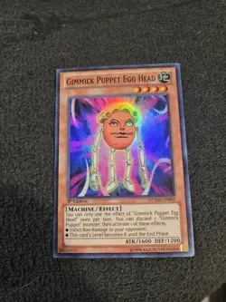 Yugioh Gimmick Puppet Egg Head NUMH-EN005 Super Rare 1st Edition - Image 1