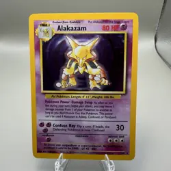 Pokemon TCG Alakazam Base Set 1/102 Holo 1999-2000 Wizards Base Set Copyright... - Image 1