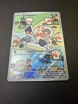 Clobbopus 207/191 - 2024 Surging Sparks Illustration Rare - Pokemon Card (NM) - Image 1