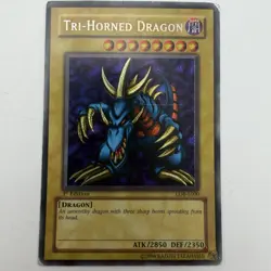 Yugioh Tri-Horned Dragon LOB-E000 Secret Rare 1st Edition - Image 1
