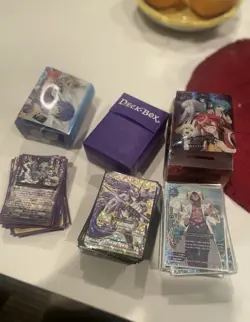 Large Cardfight Vanguard card lot including holo and foil cards. - Image 1