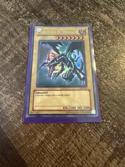 Yu-Gi-Oh! TCG Red-Eyes Black Dragon Holo Rare Card SDJ-001 Vintage 1996 - Image 1