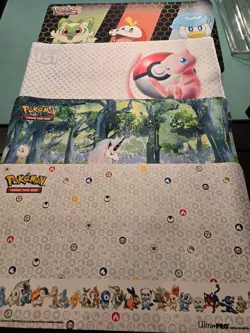 Lot of 4 Pokemon Playmats with storage tubes - Image 1