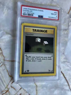 1999 Pokemon Gambler 60/62 Fossil 1st Edition PSA 8 - Image 1