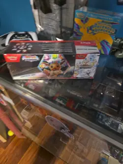 Pokemon Prismatic Evolutions Sam’s Club Exclusive Surprise Box + Booster Bundle - Image 1