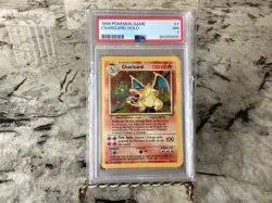1999 Pokemon Game Charizard #4 Holo PSA 7 NEAR MINT - Image 1