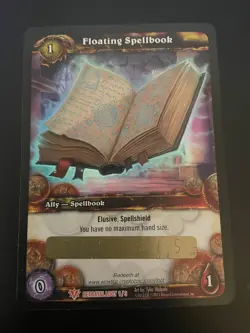 World of Warcraft WOW TCG FLOATING SPELLBOOK Unscratched Loot Card - Image 1