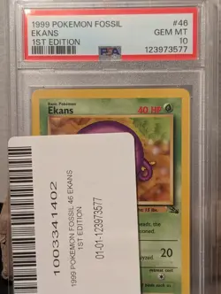 1999 POKEMON FOSSIL 1ST ED #46 EKANS PSA 10 - Image 3