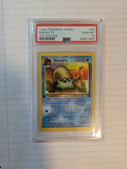 1999 Pokemon Fossil Omanyte 1st Edition #52 PSA 10 - Image 1