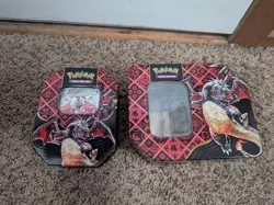 Pokemon Paldean Fates Charizard Tins - Image 1