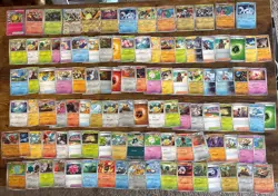 Pokemon TCG Scarlet Violet Surging Sparks 100 Card Lot - Image 1