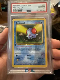 1999 POKEMON FOSSIL 1ST ED #56 TENTACOOL PSA 10 - Image 1