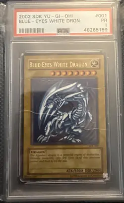 Yu-Gi-Oh Blue-Eyes White Dragon Holo SDK Star Deck Kaiba 001 PSA 1 Poor - Image 1