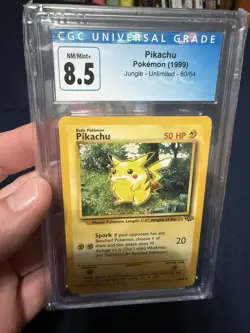 CGC 8.5 Pikachu Pokemon Jungle Unlimited 60/64 1999 Wizards of the Coast Card - Image 1