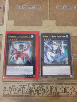 YUGIOH NUMBER 32: SHARK DRAKE PGLD GOLD + NUMBER C32: SHARK DRAKE VEISS SUPER NM - Image 1