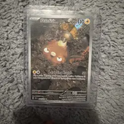 Pokemon Stunfisk 202/191 Sv08: Surging Sparks Holo - Image 1