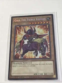 Yugioh! 1x Gaia The Fierce Knight MZMU-EN058 Secret Rare 1st Ed NM - Image 1