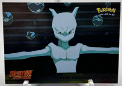 1999 Topps Pokemon the First Movie Stealing Pokemon Silver Foil #27 Blue Logo - Image 1