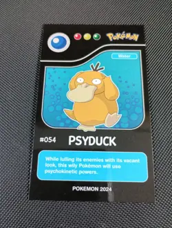 2024 POKEMON POKEDEX BLACK Edition Card #054 Psyduck Peru US Seller - Image 1
