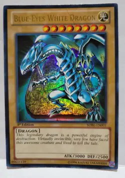 YUGIOH BLUE EYES WHITE DRAGON SDBE-EN001 1 ST.ED. ULTRA HEAVY PLAYED - Image 1