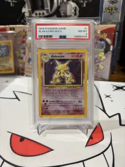 1999 Pokemon Base Set Alakazam Holographic 1/102 PSA 8 - Image 1