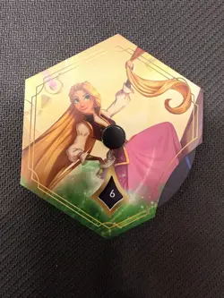 Disney Lorcana: Reign of Jafar Rapunzle League Promo Prize Lore Tracker - Image 1