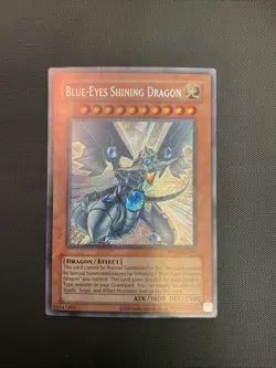 Blue-Eyes Shining Dragon RP02-EN096 Secret Rare LP Foil Bleed 2020 Reprint - Image 1