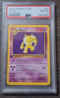 1999 POKEMON FOSSIL 1ST ED #23 HYPNO PSA 8 - Image 1