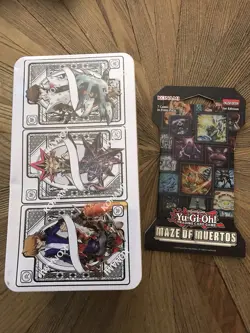 YU-GI-OH 2025 MEGA-PACK Tin Sealed With Small Dent, Sealed Maze Of Muertos Pack - Image 1