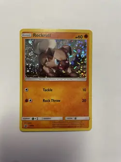 Pokemon TCG Rockruff SM06 Holo Card SM Promos - Image 1