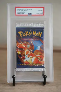 PSA 8 Pokemon TCG Base Set Unlimited Booster Pack Charizard Artwork WOTC 1999 - Image 1