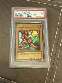 2002 YU-GI-OH! LOB-LEGEND OF BLUE EYES #121 LEFT LEG OF THE FORBIDDEN ONE PSA 7 - Image 1