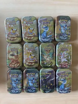 Pokemon TCG: Prismatic Evolutions Mini Tins x12– New & Sealed ✅ - Image 1