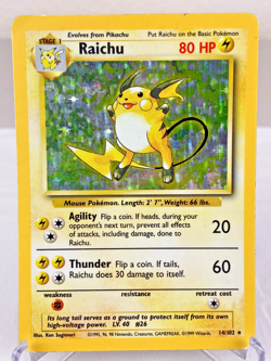 Raichu 014/102 Base Set Holo Rare WOTC Pokemon Card - Heavily Played - Image 1