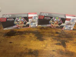 Lot Of 2 Sam’s Club Pokemon Prismatic Evolutions Surprise Boxe & Booster Bundle - Image 1