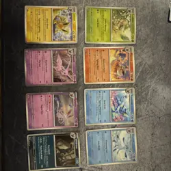 Pokemon TCG Prismatic Evolutions Costco Mini Tin Cosmos Promo Cards Set Of 8 NM - Image 1