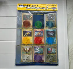 Neo Genesis Premium File 3 - Pokemon TCG WOTC - NM 9 Card Set, Folder & Wrap - Image 1