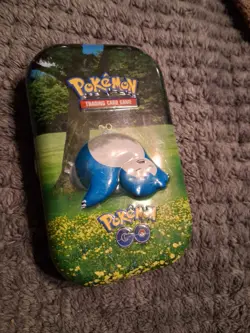 Pokemon Trading Card Game GO Mini Tin, Snorlax, w/ Mixed Cards - Image 1