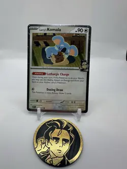 SWIRL Larry's Komala 175/217 Ascended Heros Cosmos Holo Promo with Coin- Pokemon - Image 2