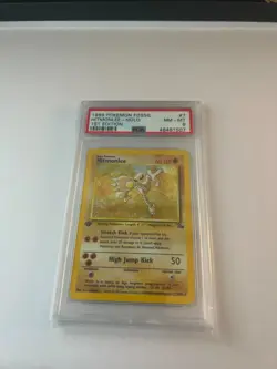 1999 POKEMON FOSSIL 1ST EDITION #7 HITMONLEE-HOLO PSA 8 - Image 1