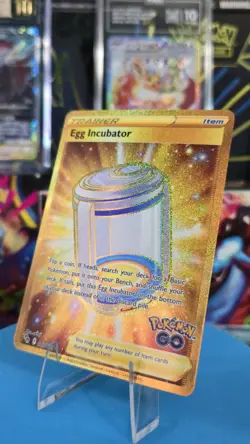 Egg Incubator Gold Trainer 087/078 Pokemon TCG SWSH Pokemon Go Gold Secret Rare - Image 1