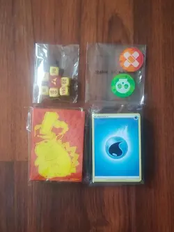 Vivid Voltage ETB Pikachu Sleeves, Status Counters, Dice, & pack of energy cards - Image 1