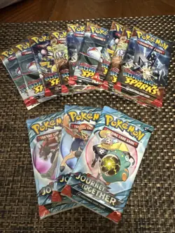 Pokemon Surging Sparks/Journey Together 12 Pack Lot - Image 1
