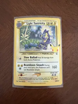 Light Toxtricity SWSH137 Pokemon Celebrations 25th Anniversary NM Holo - Image 1