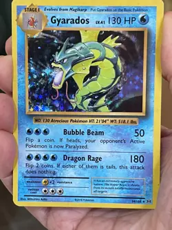 POKEMON GYARADOS 34/108 RARE HOLOFOIL EVOLUTIONS NM CARD - Image 1
