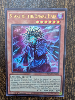 Yugioh - Stare of The Snake Hair Ultra Rare MZMU-EN003, Near Mint, 1st Edition - Image 1