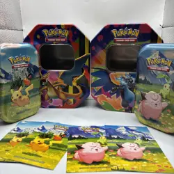 Pokemon (LOT 7 COINS) (LOT 4 TINS) (148 CODES) (200+ ENERGY’S) (300 TRAINER’S) - Image 1