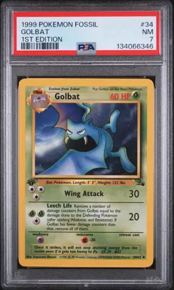 1999 POKEMON FOSSIL 1ST ED #34 GOLBAT PSA 7 - Image 1