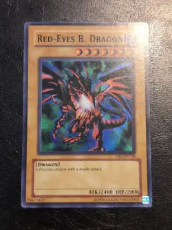 Yu-Gi-Oh! SUPER RARE HOLO CARD RED EYES B. DRAGON DB1-EN126 LP - Image 1